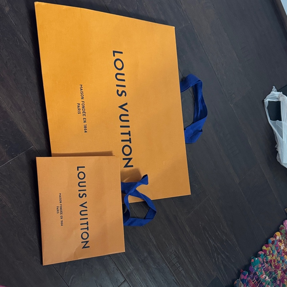 Louis Vuitton Bold Orange Bags with Blue Handles